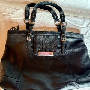 The Sak Black Leather Shoulder Bag with Silver Accents